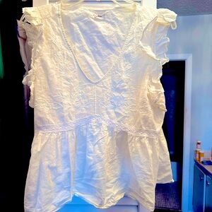 Off white shabby cotton top with ruffle sleeve and umpire pleat.